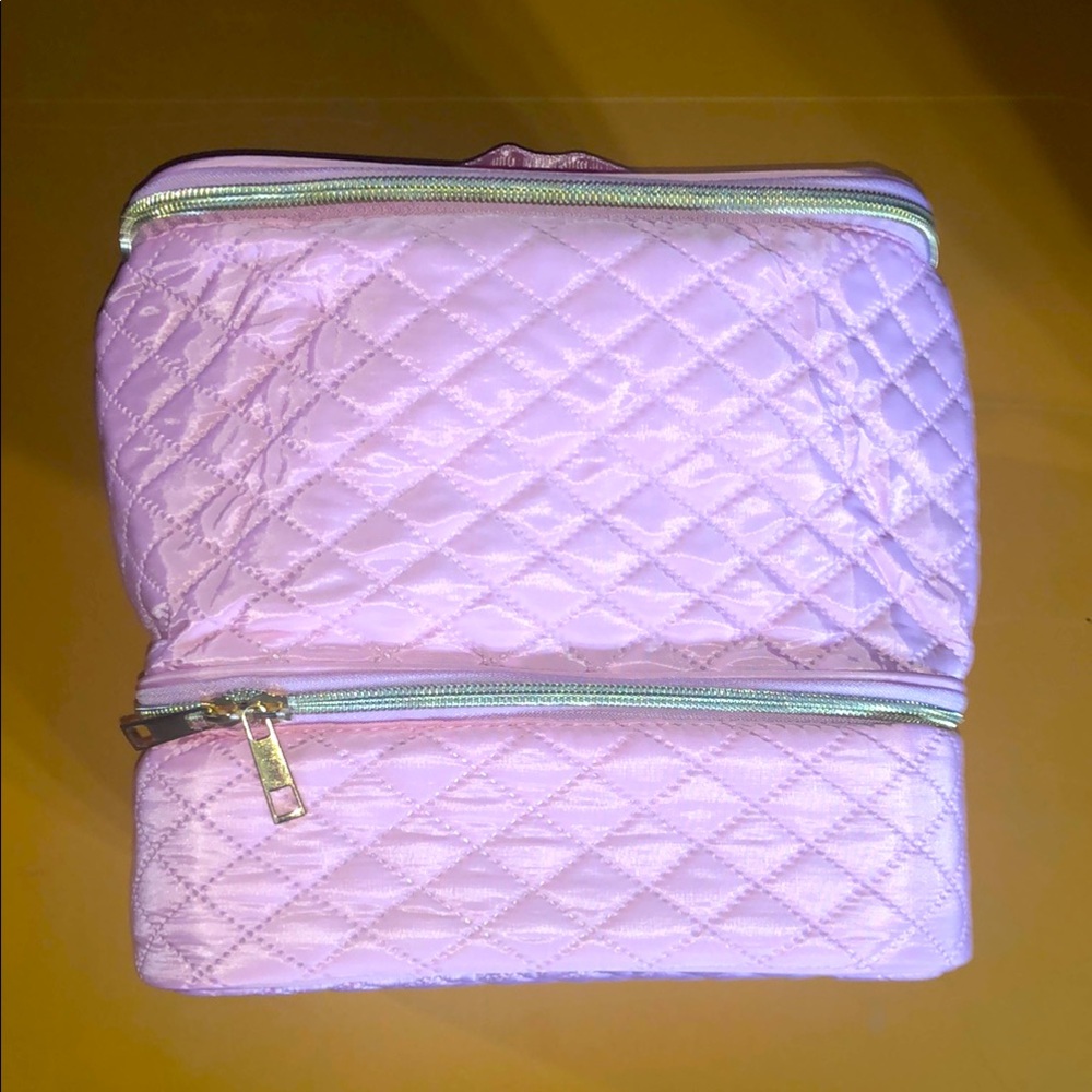 Pink quilted manicure and cosmetics bag